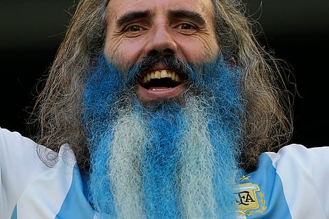 Argentina fan cheers prior to the start of the Copa America final